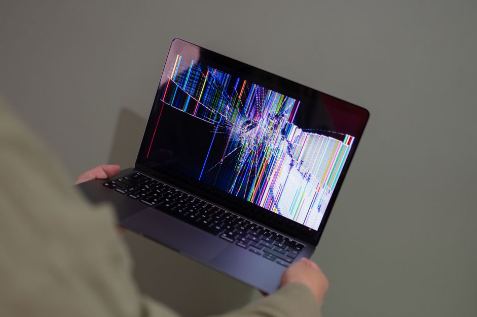 Broken laptop screen representing a rejected DataAnnotation signup from India