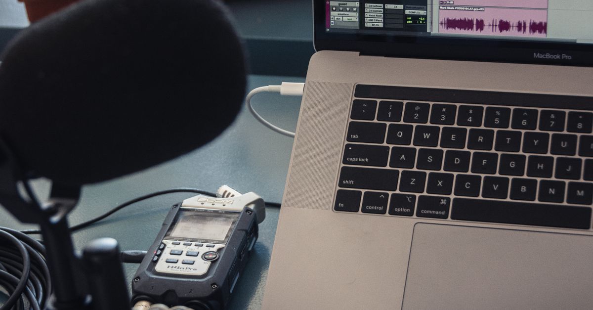 Microphone and laptop set up for the voice recording tasks these platforms advertise