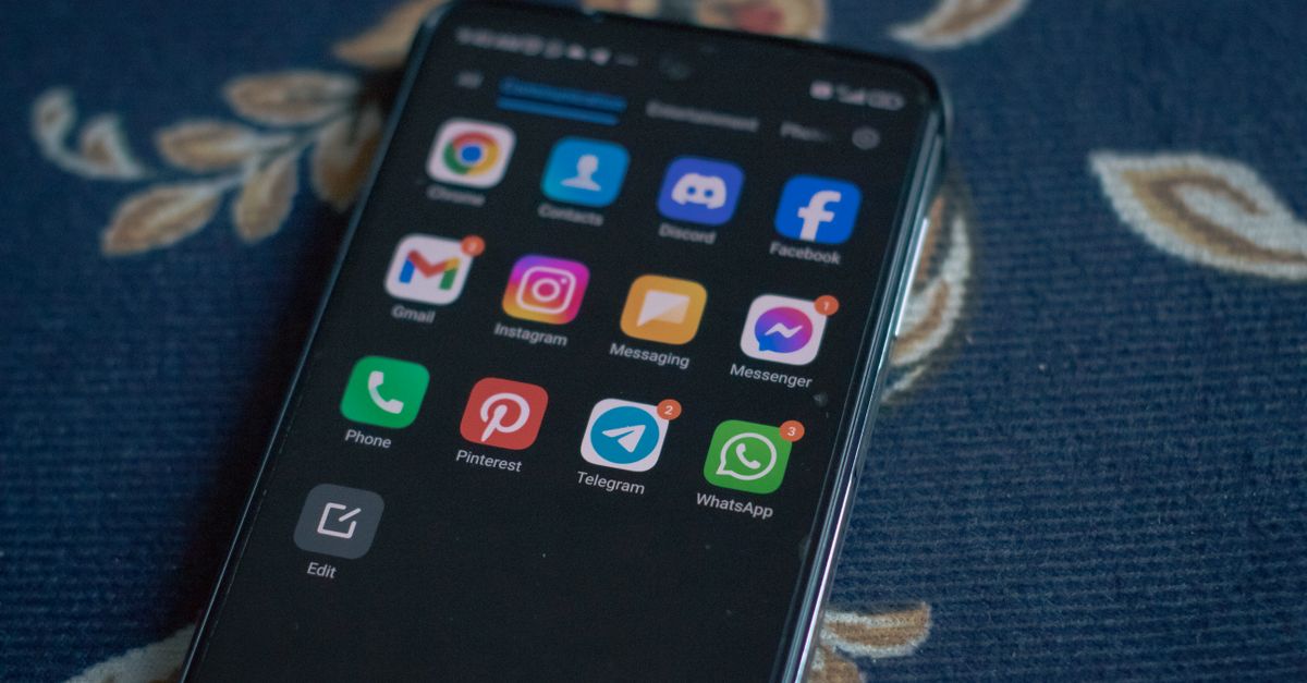 A phone showing WhatsApp, where most captcha entry job offers in India arrive